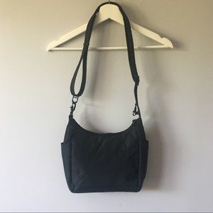 Pacsafe black anti-theft crossbody travel bag RFID